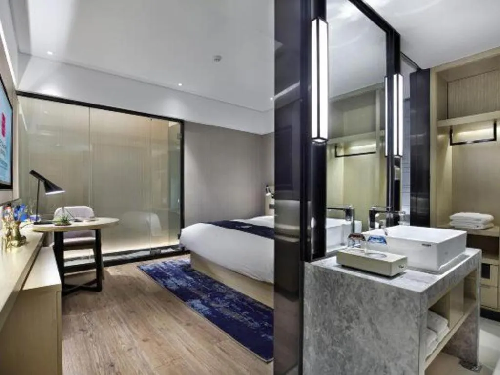 Bed in Echarm Hotel Guilin North High Speed Railway Station