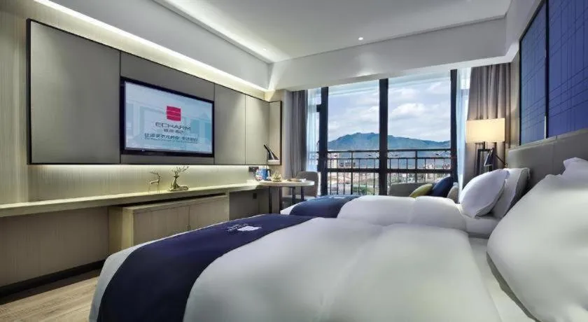 Bed in Echarm Hotel Guilin North High Speed Railway Station