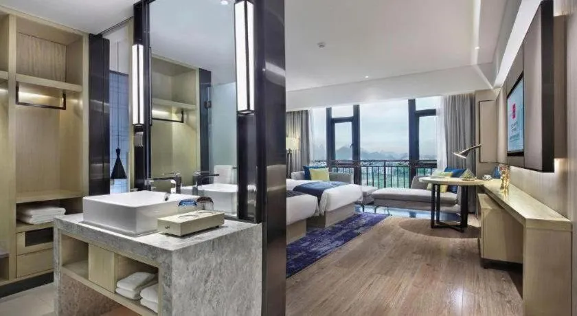 Bed in Echarm Hotel Guilin North High Speed Railway Station