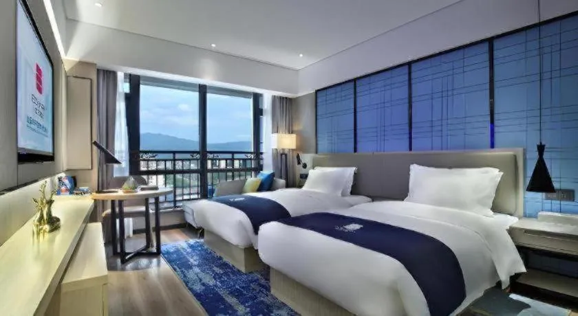 Bed in Echarm Hotel Guilin North High Speed Railway Station