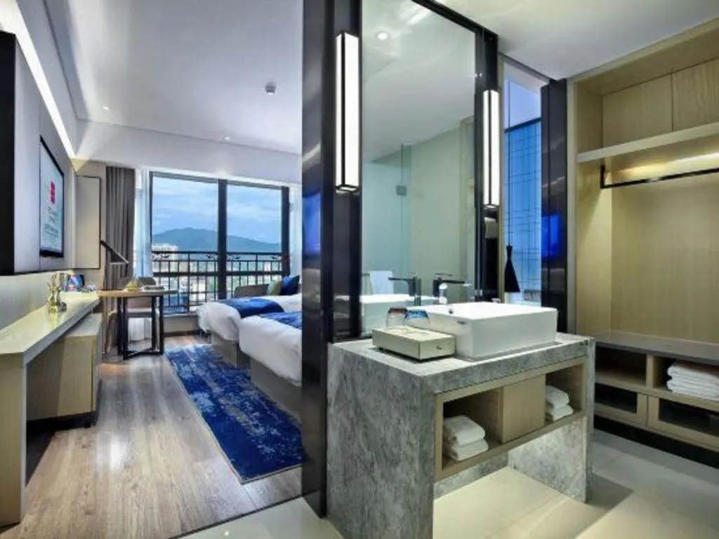 Bed in Echarm Hotel Guilin North High Speed Railway Station