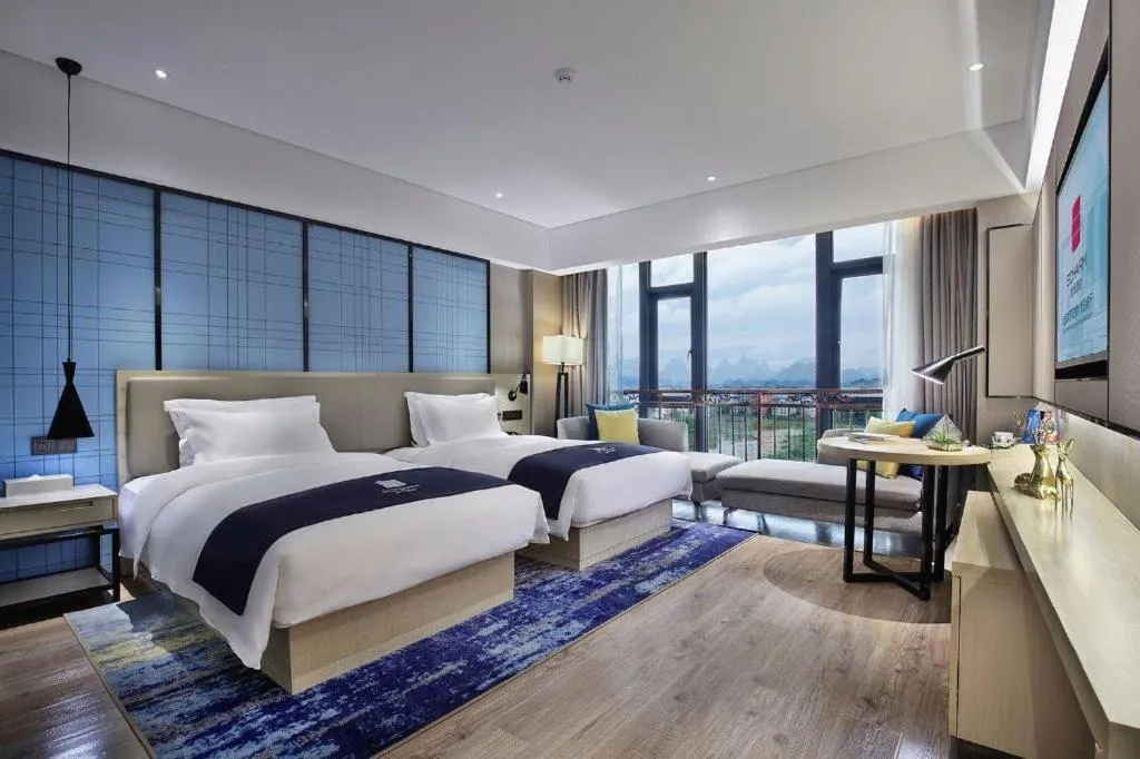 Bed in Echarm Hotel Guilin North High Speed Railway Station