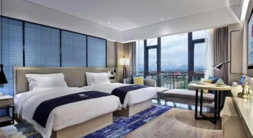 Bed in Echarm Hotel Guilin North High Speed Railway Station