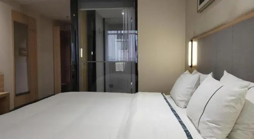 Bed in City Comfort Inn Hechi Du'an Wenti Square Bed in City Comfort Inn Hechi Du'an Wenti Square