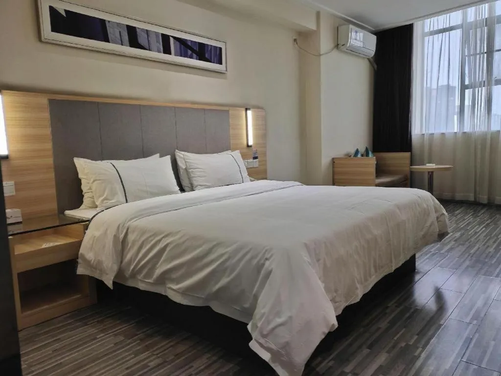 Bed in City Comfort Inn Hechi Du'an Wenti Square