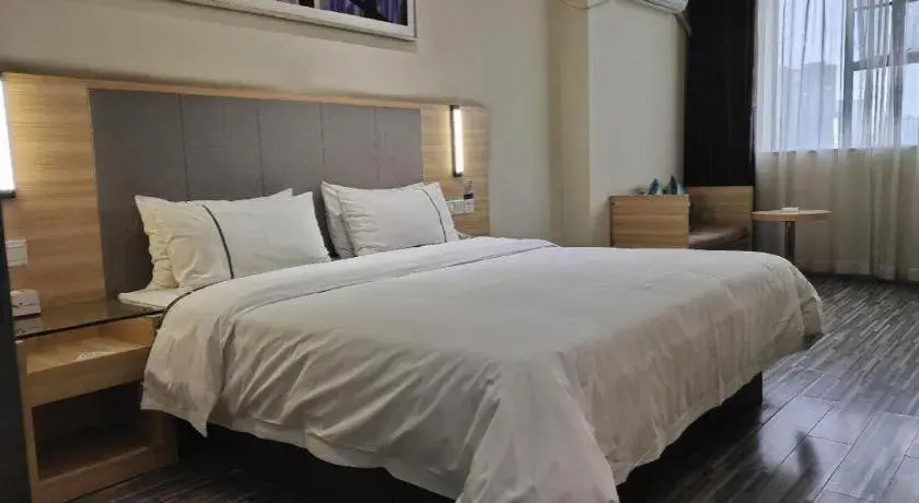 Bed in City Comfort Inn Hechi Du'an Wenti Square Bed in City Comfort Inn Hechi Du'an Wenti Square
