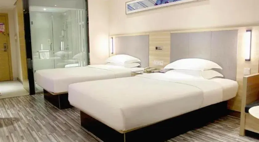 Bed in City Comfort Inn Hechi Du'an Wenti Square Bed in City Comfort Inn Hechi Du'an Wenti Square