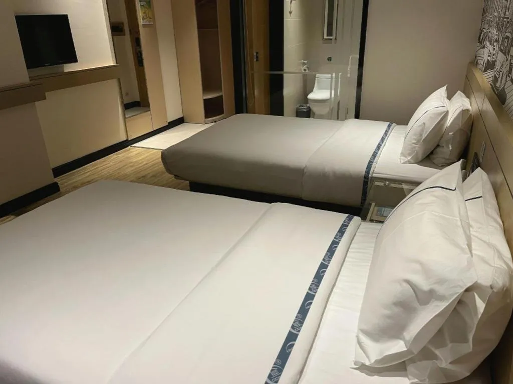 Bed in City Comfort Inn Hechi Du'an Wenti Square