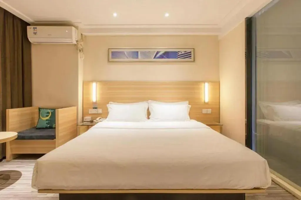 Bed in City Comfort Inn Hechi Du'an Wenti Square Bed in City Comfort Inn Hechi Du'an Wenti Square