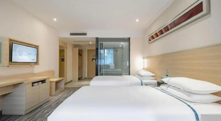 Bed in City Comfort Inn Hechi Du'an Wenti Square Bed in City Comfort Inn Hechi Du'an Wenti Square