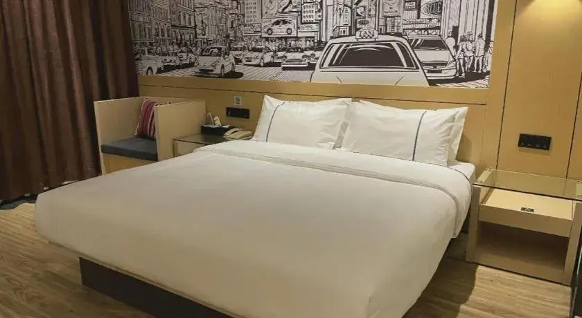 Bed in City Comfort Inn Hechi Du'an Wenti Square Bed in City Comfort Inn Hechi Du'an Wenti Square