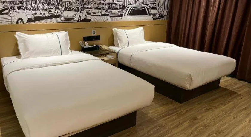 Bed in City Comfort Inn Hechi Du'an Wenti Square