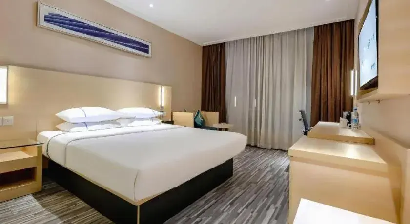 Bed in City Comfort Inn Hechi Du'an Wenti Square Bed in City Comfort Inn Hechi Du'an Wenti Square