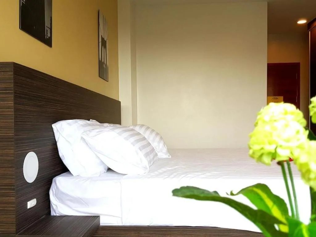 Bed in THE ALL 24 Luxury Residence