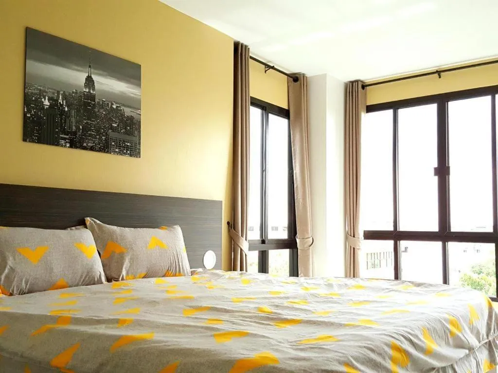 Bed in THE ALL 24 Luxury Residence