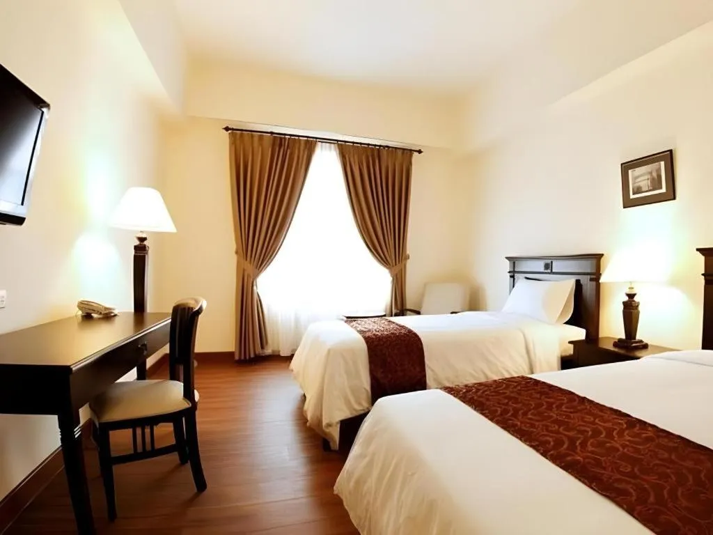 Bed in Colonial Hotel Makassar