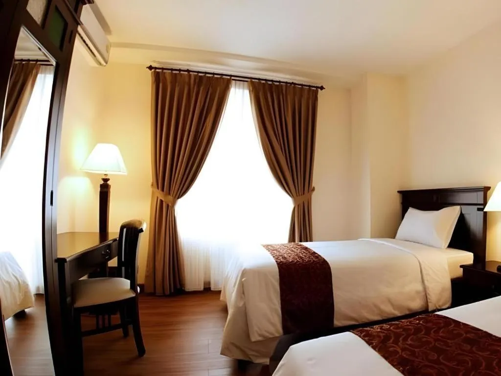 Bed in Colonial Hotel Makassar