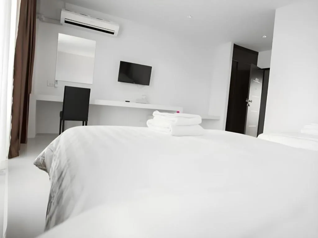 Bed in The Viewpoint Hotel