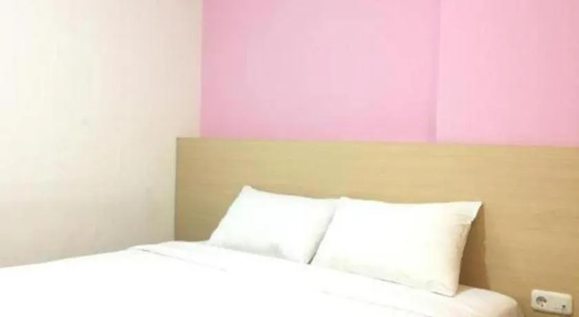 Bed in I&M Hotel Billiard