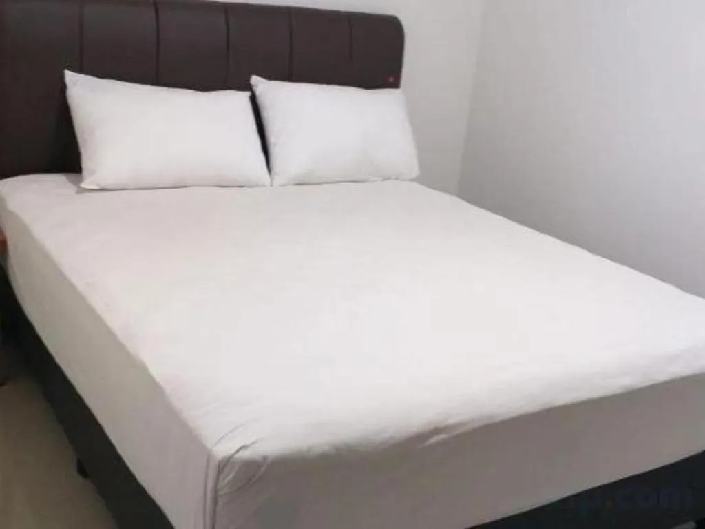 Bed in I&M Hotel Billiard