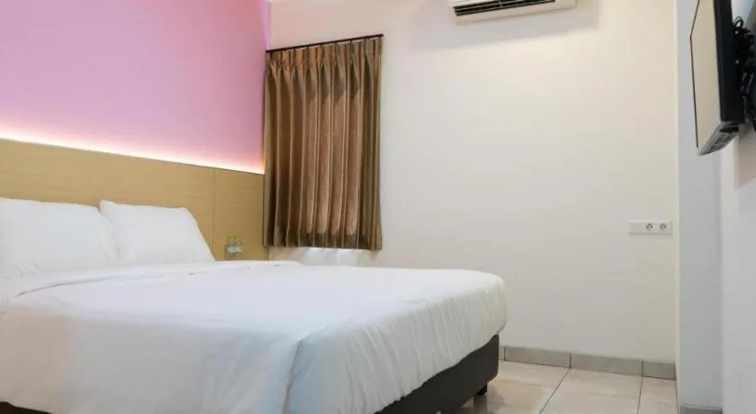 Bed in I&M Hotel Billiard