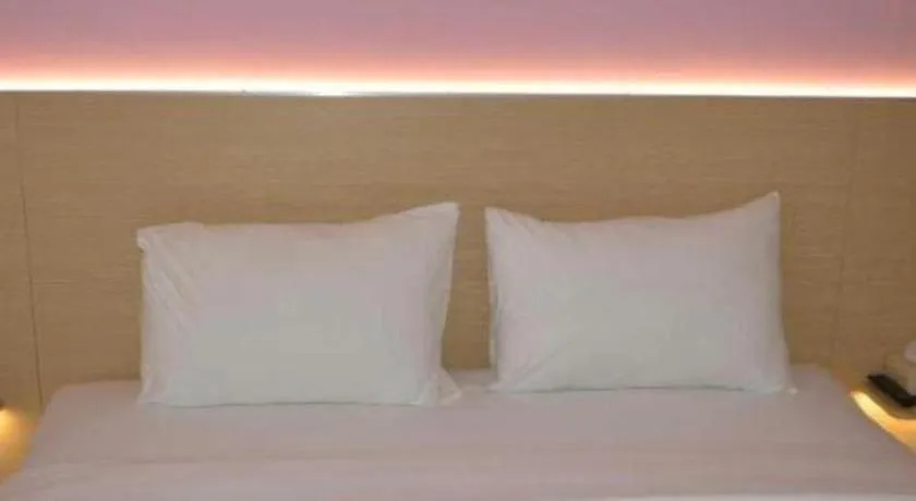 Bed in I&M Hotel Billiard