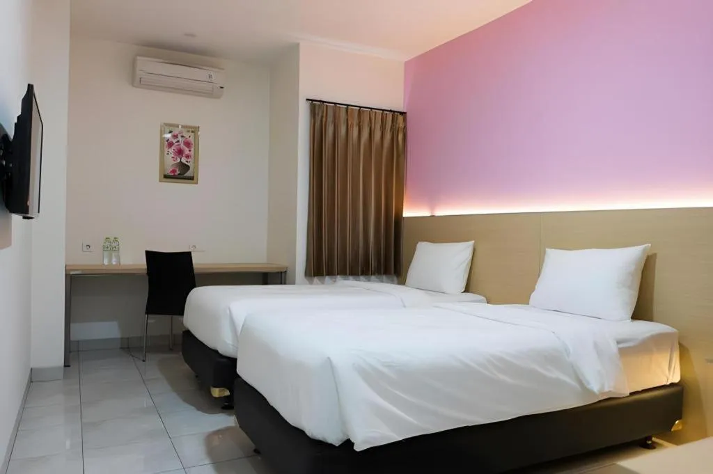 Bed in I&M Hotel Billiard