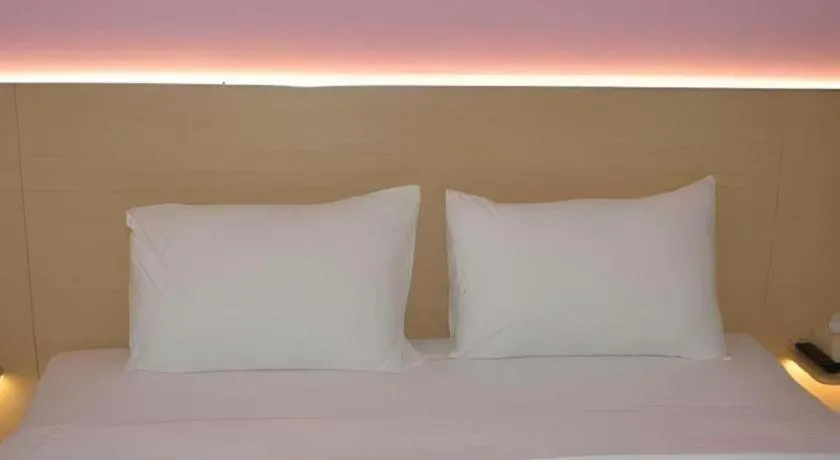 Bed in I&M Hotel Billiard