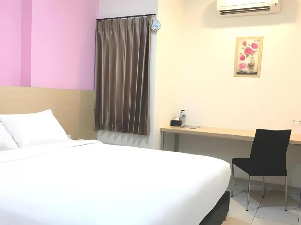 Bed in I&M Hotel Billiard