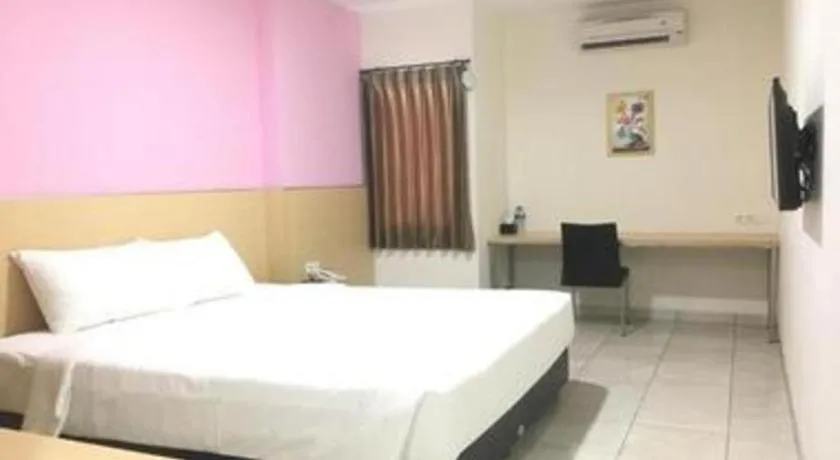 Bed in I&M Hotel Billiard