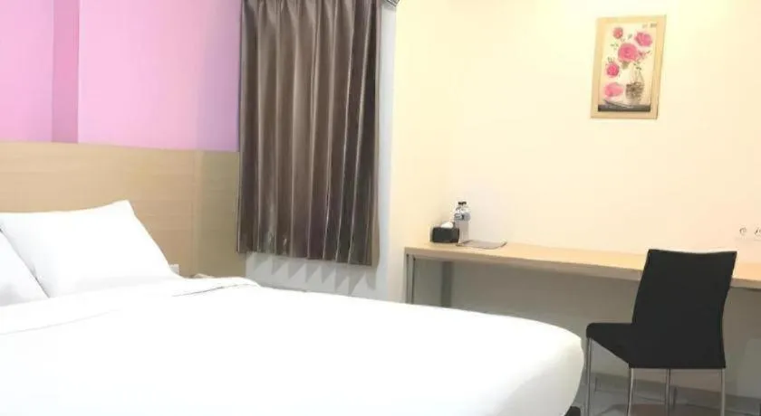 Bed in I&M Hotel Billiard