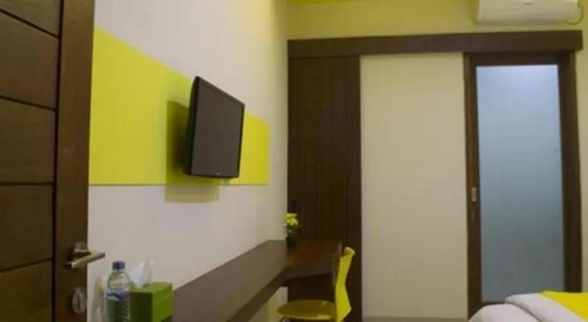 Bed in De Lemon Gatsu Hotel