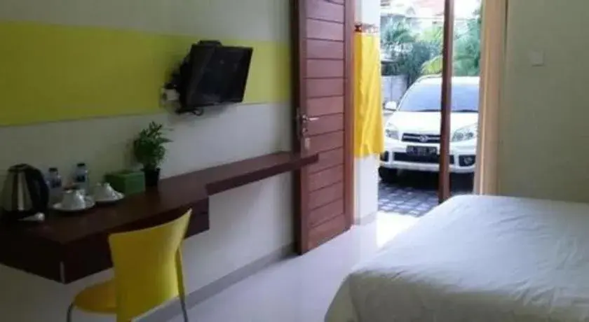 Bed in De Lemon Gatsu Hotel Bed in De Lemon Gatsu Hotel