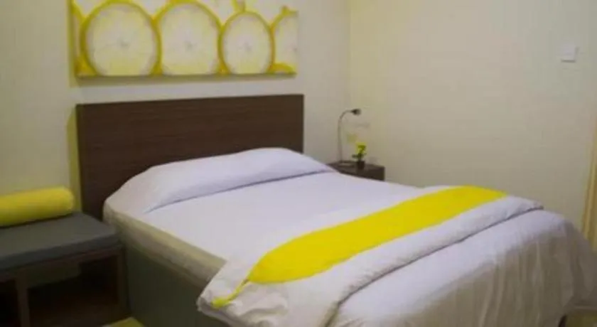 Bed in De Lemon Gatsu Hotel