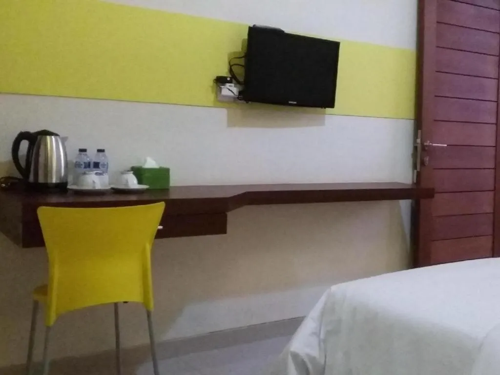 Bed in De Lemon Gatsu Hotel