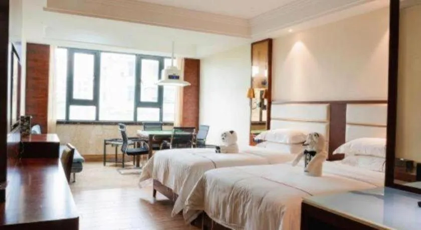 Bed in Haikou Kai Wei Hotel