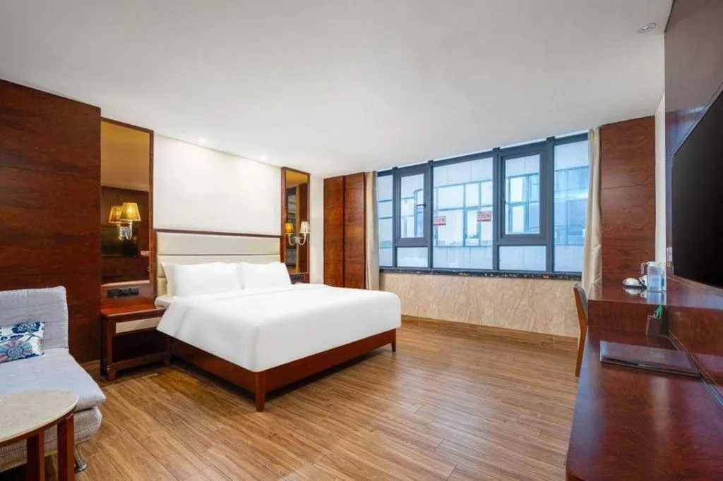 Bed in Haikou Kai Wei Hotel