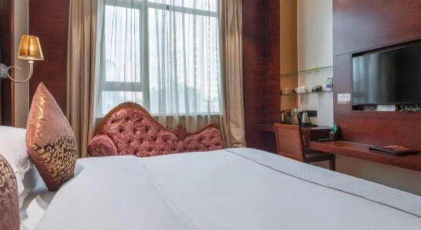 Bed in Haikou Kai Wei Hotel