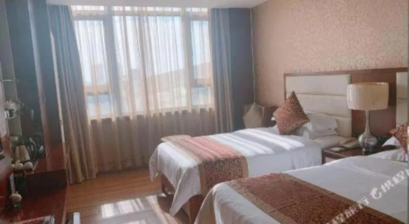 Bed in Haikou Kai Wei Hotel