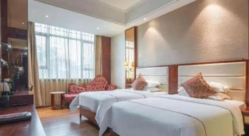 Bed in Haikou Kai Wei Hotel Bed in Haikou Kai Wei Hotel