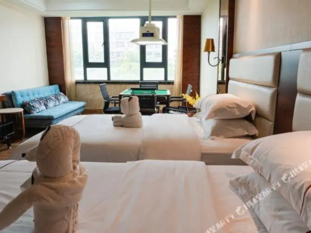 Bed in Haikou Kai Wei Hotel Bed in Haikou Kai Wei Hotel