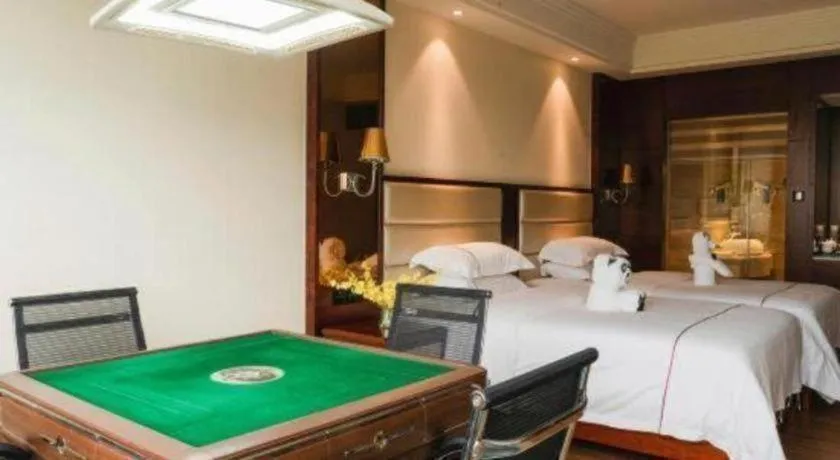 Bed in Haikou Kai Wei Hotel