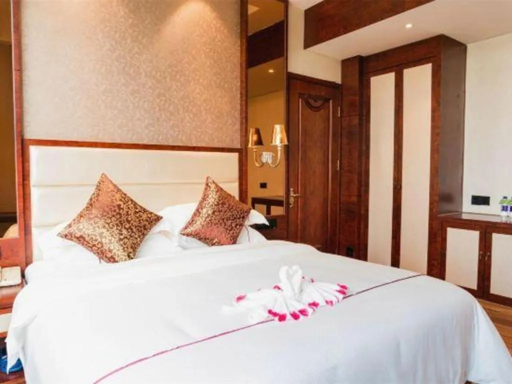 Bed in Haikou Kai Wei Hotel