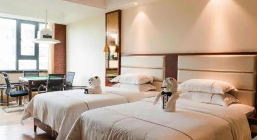 Bed in Haikou Kai Wei Hotel