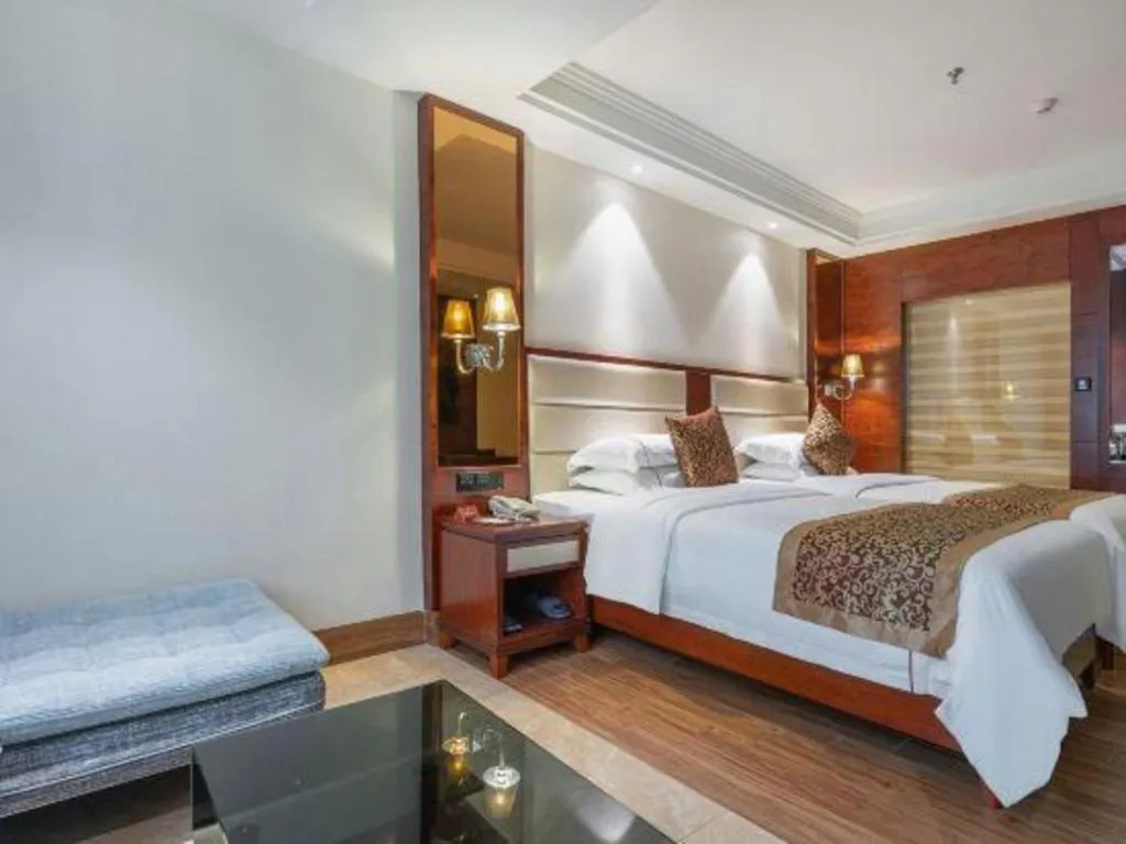 Bed in Haikou Kai Wei Hotel