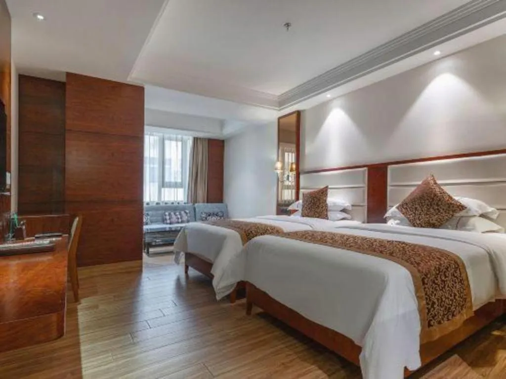 Bed in Haikou Kai Wei Hotel