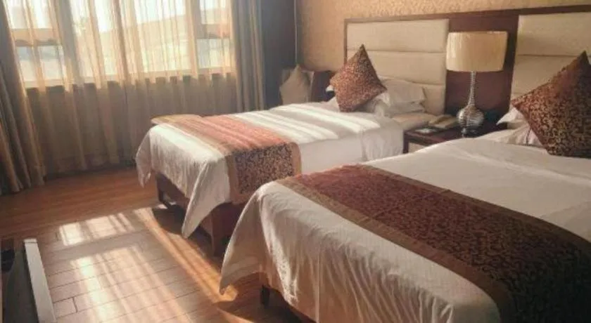Bed in Haikou Kai Wei Hotel