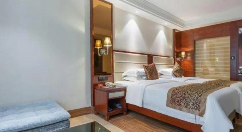 Bed in Haikou Kai Wei Hotel