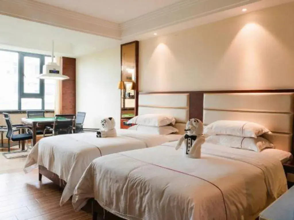 Bed in Haikou Kai Wei Hotel Bed in Haikou Kai Wei Hotel