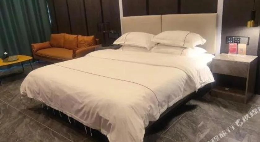 Bed in Haikou Kai Wei Hotel